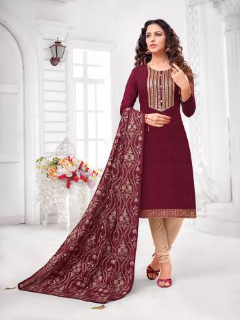 Grab This Designer Straight Suit For Your Semi-Casual Wear In Maroon Colored Top and Dupatta Paired With Cream Colored Bottom. Its Top and Dupatta Are Art Silk Based Paired With Cotton Bottom.