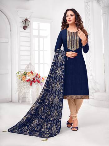 Grab This Designer Straight Suit For Your Semi-Casual Wear In Navy Blue Colored Top and Dupatta Paired With Cream Colored Bottom. Its Top and Dupatta Are Art Silk Based Paired With Cotton Bottom.