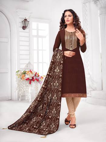 Grab This Designer Straight Suit For Your Semi-Casual Wear In Brown Colored Top and Dupatta Paired With Cream Colored Bottom. Its Top and Dupatta Are Art Silk Based Paired With Cotton Bottom.