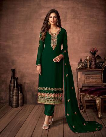 Here Is A Very Pretty Designer Straight Suit In Dark Green Color. Its Embroidered Top and Dupatta Are Fabricated On Georgette Paired with Santoon Fabricated Bottom. Its Fabrics Are Soft Towards Skin And Esnures Superb Comfort All Day Long. 