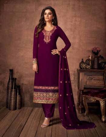 Here Is A Very Pretty Designer Straight Suit In Purple Color. Its Embroidered Top and Dupatta Are Fabricated On Georgette Paired with Santoon Fabricated Bottom. Its Fabrics Are Soft Towards Skin And Esnures Superb Comfort All Day Long. 