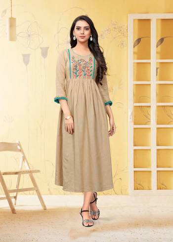 Grab This Readymade Kurti In Beige Which Is Suitable For The Upcoming Festive Season. This Pretty Kurti Is Fabricated On Linen Beautified With Thread Work. It Is Light Weight and Available In All Regular Sizes. 