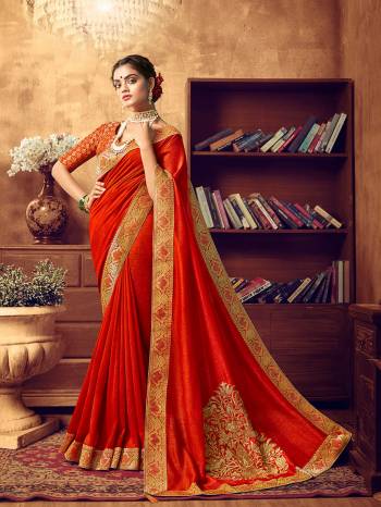 Adorn A Beautiful Angelic Look Wearing This Designer Saree In Red Color. This pretty Embroidered Saree Is Fabricated On Art Silk Paired With Jacquard Silk Fabricated Heavy Weaved Blouse. Its Attractive Color and Rich Fabric Will Earn You Lots Of Compliments From Onlookers. 