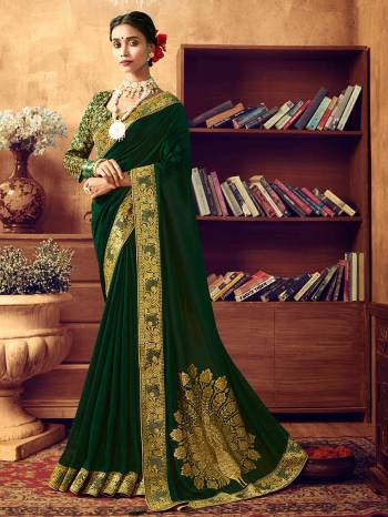Celebrate This Festive Season In Beautiful Royal Look Wearing this Designer Saree In Dark Green Color. This Pretty Saree Is Fabricated On Art Silk paired With Jacquard Silk Fabricated Blouse. It Color and Fabric Gives A Rich Look To Your Personality. 