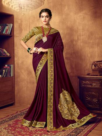 Adorn A Beautiful Angelic Look Wearing This Designer Saree In Wine Color. This pretty Embroidered Saree Is Fabricated On Art Silk Paired With Jacquard Silk Fabricated Heavy Weaved Blouse. Its Attractive Color and Rich Fabric Will Earn You Lots Of Compliments From Onlookers. 