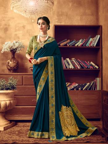 Adorn A Beautiful Angelic Look Wearing This Designer Saree In Blue Color. This pretty Embroidered Saree Is Fabricated On Art Silk Paired With Jacquard Silk Fabricated Heavy Weaved Blouse. Its Attractive Color and Rich Fabric Will Earn You Lots Of Compliments From Onlookers. 