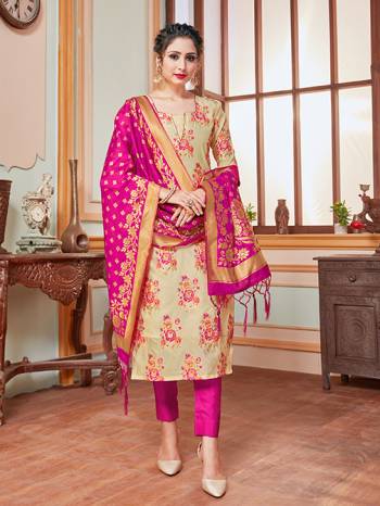 Here Is A Rich And Elegant Looking Silk Based Straight Suit In Beige Colored Top Paired With Contrasting Dark Pink Colored Bottom And Dupatta. Its Top, Bottom And Dupatta Are Fabricated On Banarasi Silk Beautified With Heavy Detailed Weave.