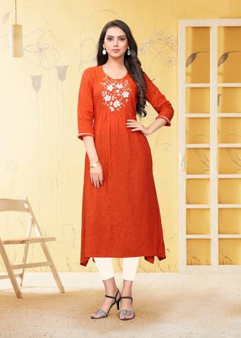 Grab This Readymade Kurti In Orange Which Is Suitable For The Upcoming Festive Season. This Pretty Kurti Is Fabricated On Linen Beautified With Thread Work. It Is Light Weight and Available In All Regular Sizes. 