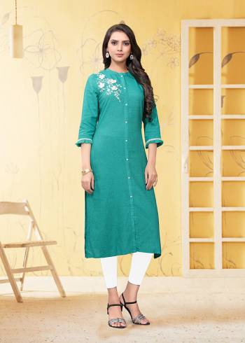 Add This Pretty Readymade Kurti To Your Wardrobe In Sky Blue Color. This Kurti Is Fabricated On Linen Beautified With Thread Work. 