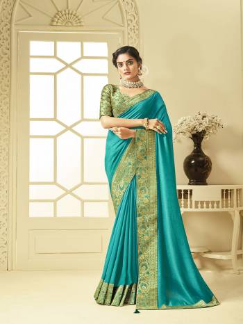 Add This Very Pretty And Elegant Looking Saree With Broad Weaved Border In Sky Blue Color. This Saree Is Fabricated On Art Silk Paired With Brocade Fabricated Blouse. Its Fabric Gives A Rich Look To Your Personality. 