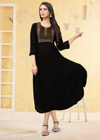 Here Is A Prefect Kurti For The Upcoming Festive Season In Black Color. This Readymade Kurti Is Fabricated On Georgette Beautified With Thread Work. It Is Light In Weight And Available In All Regular Sizes. 