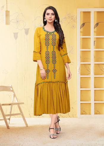 Here Is A Prefect Kurti For The Upcoming Festive Season In Musturd Yellow Color. This Readymade Kurti Is Fabricated On Georgette Beautified With Thread Work. It Is Light In Weight And Available In All Regular Sizes. 