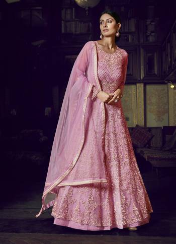 Look Pretty In This Beautiful Designer Floor Length Gown In Pink Color Paired With Pink Colored Dupatta. This Semi-Stitched Gown And Dupatta Are Fabricated On Net Beautified With Pretty Embroidery. Buy Now.