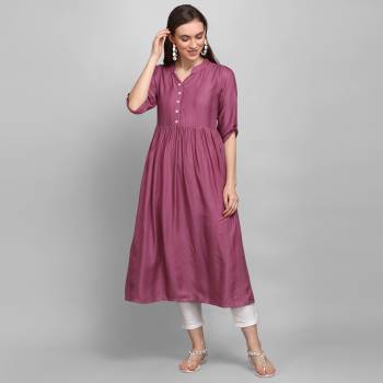 Simple and Elegant Looking Readymade Kurti Is Here In Wine Color. This Pretty Kurti Is Fabricated On Rayon Which Is Soft Towards Skin And Easy To Carry All Day Long. Also, You Can Style This Plain Kurti In Many Ways As Per The Occasion. 