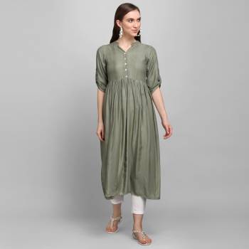 Must Have Piece To Your Wardrobe Is Here With This Readymade Kurti In Olive Grey Color Fabricated On Rayon With Self Work. This Kurti Is Suitable For Semi-Casual As Well As Festive Wear When Styled With Oxidize Jewelley And Sheer Dupatta. 