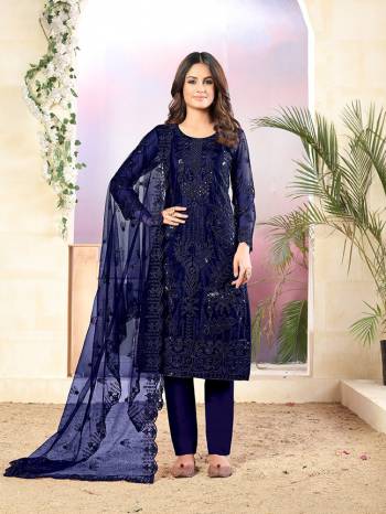 Grab This Very Pretty Designer Straight Suit In Navy Blue Color Which Is Suitable For The Upcoming Wedding And Festive Season. Its Top And Dupatta Are Fabricated On Net Beautified With Elegant Tone To Tone Embroidery Paired With Santoon Bottom. 