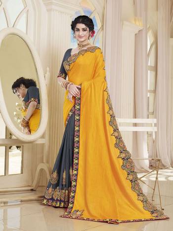 Add This Very Beautiful Designer Saree To Your Wardrobe In Yellow and Grey Color. This Saree and Blouse Are Silk Based Beautified With Embroidery. It Is Suitable For The Upcoming Wedding And Festive Season. 