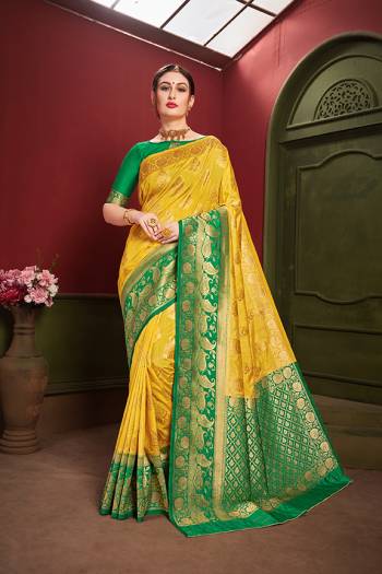 Adorn A Royal Traditional Look Wearing This Designer Silk Based saree In Yellow And Green color. This Saree IS Fabricated On Banarasi Art Silk Paired With Art Silk Fabricated blouse. It Is Beautified With Rich Weave All Over. 