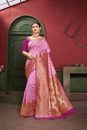 Adorn A Royal Traditional Look Wearing This Designer Silk Based saree In Lilac And Purple color. This Saree IS Fabricated On Banarasi Art Silk Paired With Art Silk Fabricated blouse. It Is Beautified With Rich Weave All Over. 