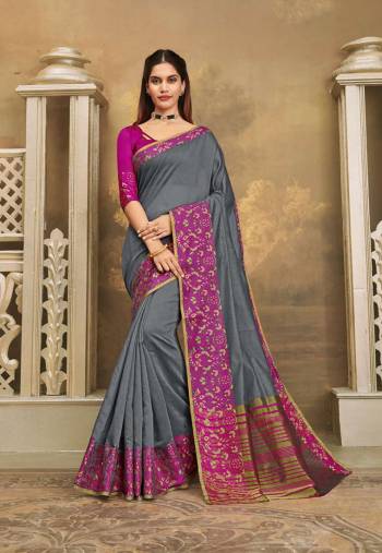 For A Decent And Formal Look, Grab This Pretty Elegant Looking Saree In Grey Color Paired With Contrasting Magenta Pink Colored Blouse. This Saree And Blouse Are Fabricated On Khadi Silk Beautified With Broad Weaved Border. 