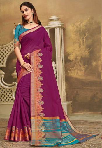 Here IS A Pretty Elegant Looking Saree In Magenta Pink Color Paired With Contrasting Blue Colored Blouse. This Saree And Blouse Are Fabricated On Khadi Silk Which Also Gives A Rich Look To Your Personality. 