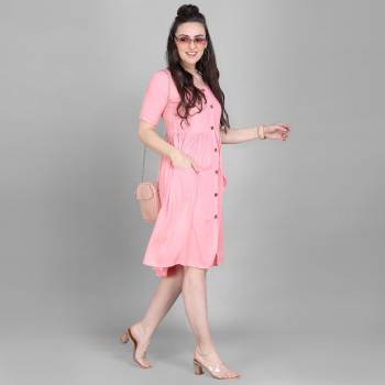 Grab This Super Comfy Readymade Kurti In Pink Color Fabricated On Rayon. Its Pretty Tunic Pattern And Fabric Ensures Superb Comfort All Day Long. Buy Now.