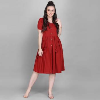 Grab This Super Comfy Readymade Kurti In Red Color Fabricated On Rayon. Its Pretty Tunic Pattern And Fabric Ensures Superb Comfort All Day Long. Buy Now.