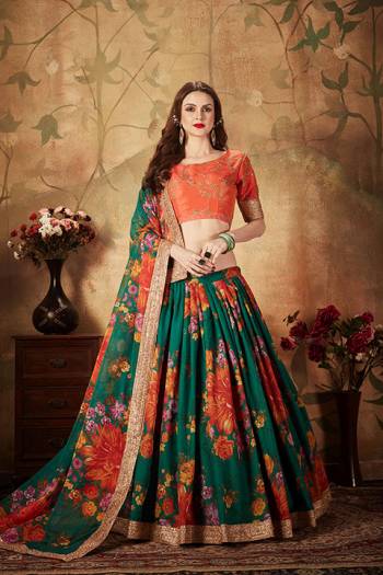 You Will Definitely Earn Lots Of Compliments Wearing This Orgenza Based Designer Lehenga Choli In Orange Colored Blouse Paired With Contrasting Pine Green Colored Lehenga and Dupatta. Its Blouse Is Silk Based Beautified With Embroidery Paired With Orgenza Fabricated Lehenga And Dupatta Beautified With Prints.