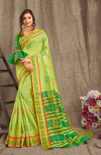 Adorn A Pretty Traditional Look Wearing This Saree In Light Green Color Paired With Contrasting Green Colored blouse. This Saree And Blouse Are Fabricated On Cotton Handloom Beautified With Weave All Over. 