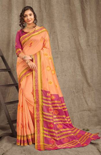 Adorn A Pretty Traditional Look Wearing This Saree In Peach Color Paired With Contrasting Magenta Pink Colored blouse. This Saree And Blouse Are Fabricated On Cotton Handloom Beautified With Weave All Over. 