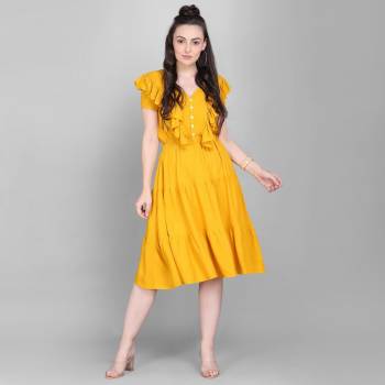 Here Is A Lovely Readymade Western Dress Pattern Readymade Kurti In Yellow Color. This Kurti Is Fabricated On Rayon Which Is Soft Towards Skin And Easy To Carry All Day Long. 