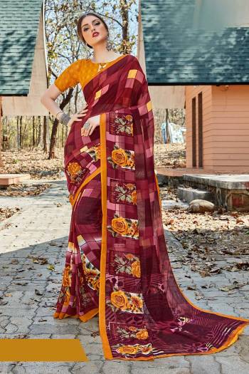 For Your Casual Or Semi-Casual Wear, Grab This Printed saree In Maroon Color paired With Musturd Yellow Colored blouse. This Saree And Blouse Are Fabricated On Georgette Beautified With Prints. It Is Light In Weight And Easy To Carry All Day Long. 