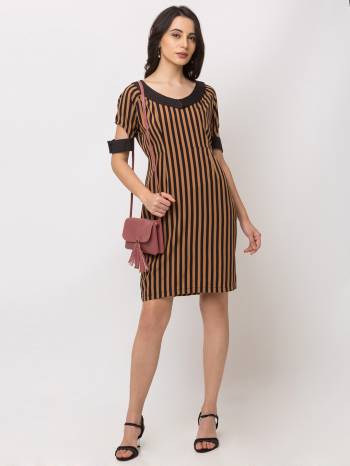 Simple And elegant Looking Midi Dress Is Here In Brown Color. This One-Piece Dress Is Fabricated On Crepe Beautified With Lining Prints With An Unique Shoulder Pattern. 