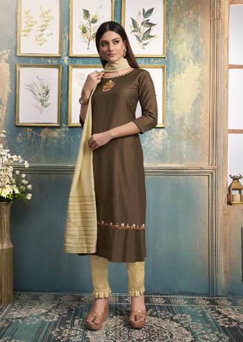 Be Ready For This Festive Season With This Readymade Straight Kurti In Brown Color Paired With Cream Colored Dupatta. This Kurti Is Satin Silk Based Paired With Viscose Silk Dupatta. 