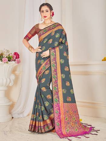 Here Is A Proper Traditional Looking Designer Silk Based saree In Dark Grey Color Paired With Magenta Pink Colored Blouse. This Saree and Blouse AreFabricated On Banarasi Art Silk Beautified With Attractive Weave. 