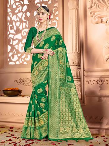 Shine Bright Wearing This Pretty Designer Green Colored Heavy?Weaved Saree. This Saree And Blouse Are Fabricated On Banarasi Art Silk Beautified With Weave All Over. It Is Suitable For Upcoming Wedding And Festive Season. Buy Now.