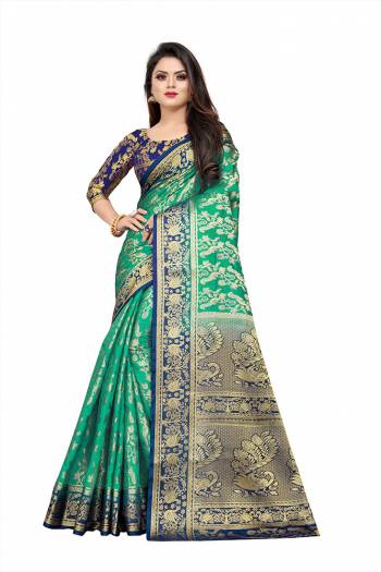 Celebrate This Festive Season In A Proper Traditonal Look Wearing This Silk Based Saree In Sea Green Color Paired With Royal Blue Colored Blouse. This Saree And Blouse Are Fabricated On Art Silk Beautified with Weave. 