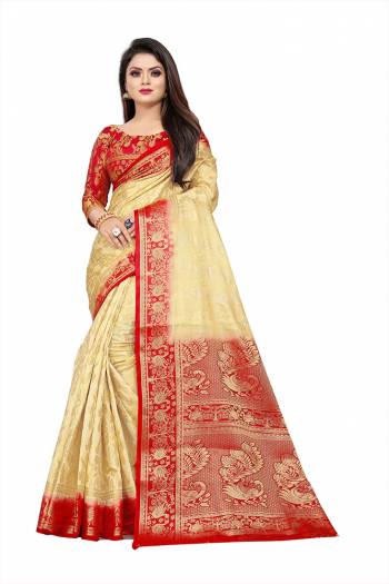 Grab This Beautiful Designer Weaved Saree In Cream color Paired With Red Colored Blouse. This Saree And Blouse Are Fabricated On Art Silk Which Also Gives A Rich Look To Your Personality. 