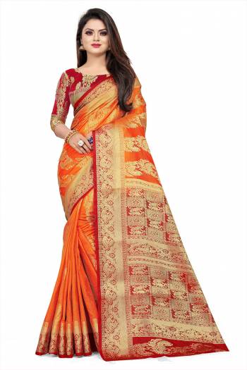 Celebrate This Festive Season In A Proper Traditonal Look Wearing This Silk Based Saree In Orange Color Paired With Red Colored Blouse. This Saree And Blouse Are Fabricated On Art Silk Beautified with Weave. 