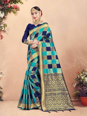 Here Is Rich Silk Based Designer Saree In Blue And Navy Blue Color Paired With Navy Blue Colored Blouse. This Saree And Blouse Are Fabricated On Banarasi Art Silk Beautified With Weave And Checks Pattern All Over. 