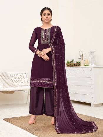 Here Is A Very Pretty Designer Straight Suit In All Over Purple Color. Its Beautiful Embroidered Top And Dupatta Are Georgette Based Paired With Santoon Bottom. Buy This Pretty Suit Now.