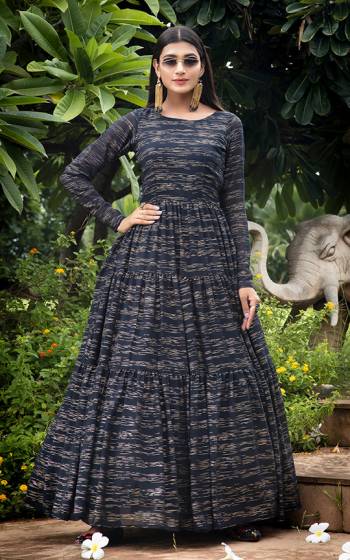 Grab This Designer Floor Length Gown In Navy Blue Color Fabricated On Georgette. This Pretty Gown Is Beautified With Prints, Also It Is Light In Weight And Easy To Carry All Day Long. 