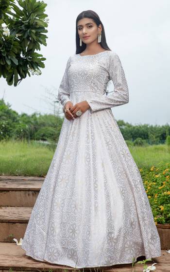 Grab This Designer Floor Length Gown In White Color Fabricated On Cotton. This Pretty Gown Is Beautified With Prints, Also It Is Light In Weight And Easy To Carry All Day Long. 