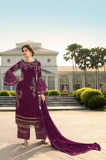 Look Beautiful Wearing This Heavy Designer Straight Suit In Wine Color. This Pretty Embroidered Top And Dupatta Are Georgette Based Paired With Santoon Fabricated Embroidered Bottom. Buy This Designer Piece Now.