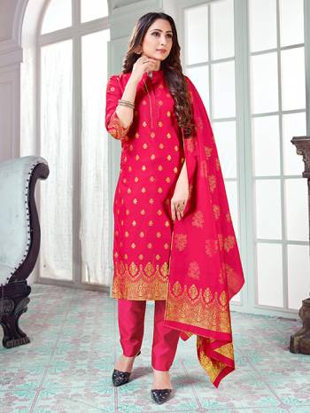 Here Is A Rich And Elegant Looking Silk Based Straight Suit In Rani Pink Color. Its Top And Dupatta Are Fabricated On Banarasi Silk Paired with Art Silk Bottom. 