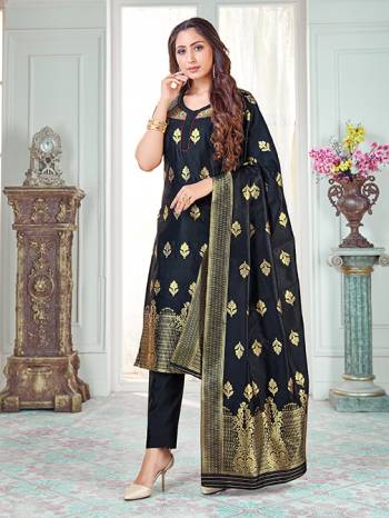 Here Is A Rich And Elegant Looking Silk Based Straight Suit In Black Color. Its Top And Dupatta Are Fabricated On Banarasi Silk Paired with Art Silk Bottom. 