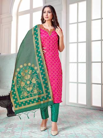 Celebrate This Festive Season In A Proper Traditional Look Wearing This Weaved Straight Suit In Rani Pink Colored Top Paired With Sea Green colored Bottom And Dupatta. This Pretty Suit Is Banarasi Silk Based Beautified With Weave. Its Fabric Gives A Rich Look To Your Personality