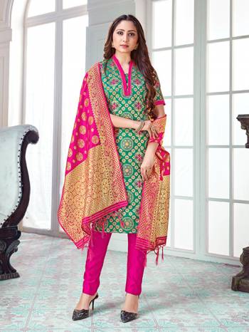 Celebrate This Festive Season In A Proper Traditional Look Wearing This Weaved Straight Suit In Sea Green Colored Top Paired With Rani Pink colored Bottom And Dupatta. This Pretty Suit Is Banarasi Silk Based Beautified With Weave. Its Fabric Gives A Rich Look To Your Personality