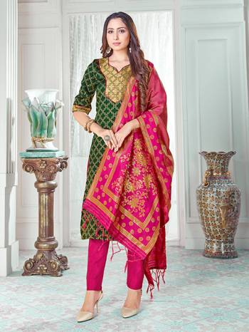 Celebrate This Festive Season In A Proper Traditional Look Wearing This Weaved Straight Suit In Dark Green Colored Top Paired With Rani Pink colored Bottom And Dupatta. This Pretty Suit Is Banarasi Silk Based Beautified With Weave. Its Fabric Gives A Rich Look To Your Personality