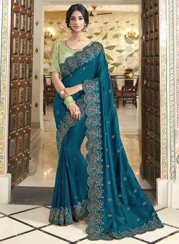 Look Attractive Wearing This Designer Saree In Blue Color Paired with Pastel Green Colored blouse. This Saree Is Fabricated On Vichitra Silk Paired With Art Silk Fabricated Blouse. Its Pretty Embroidery, Colors And Rich Fabric Will Earn You Lots Of Compliments From Onlookers. 